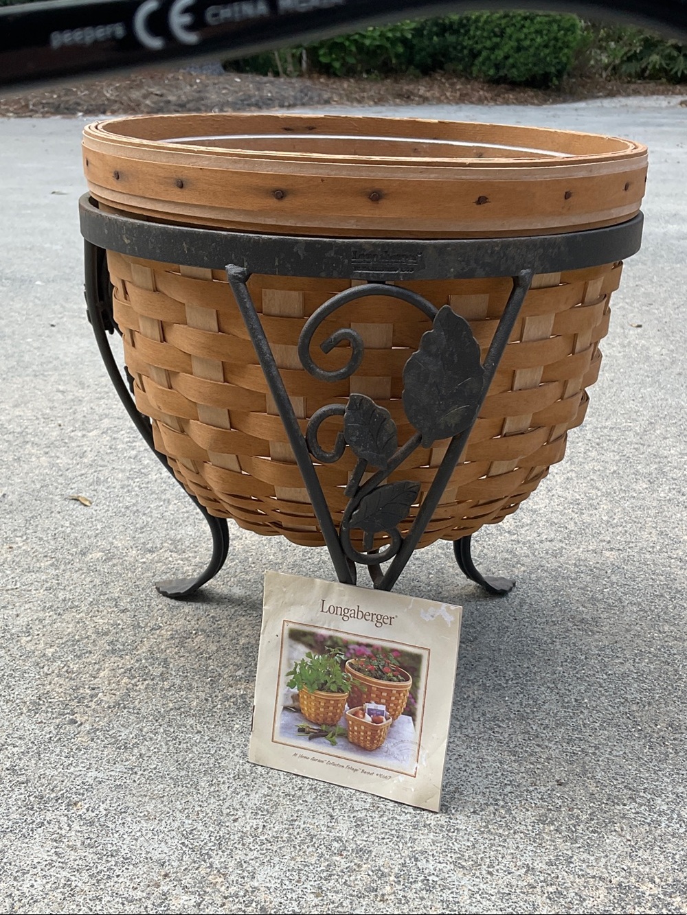 Longaberger collection Foliage basket with wrought iron stand and protector.